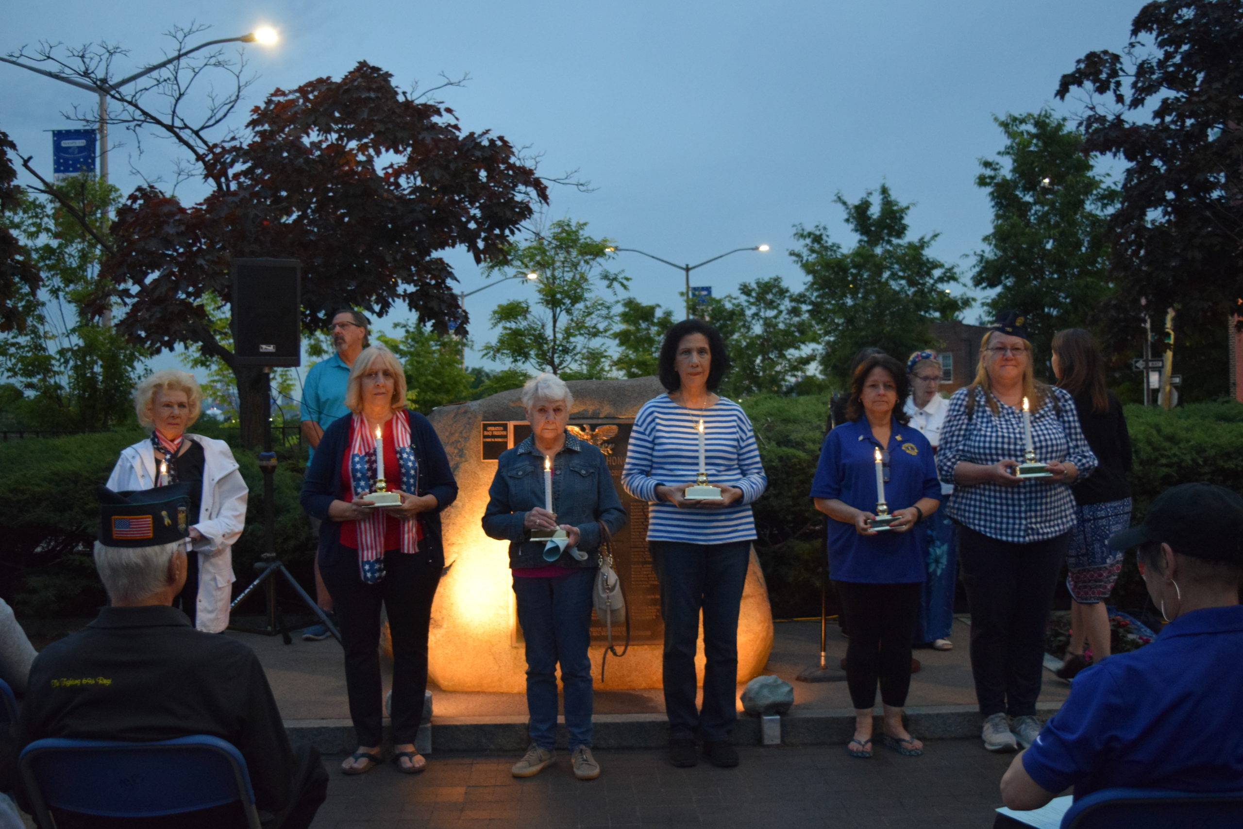 Candlelight vigil honors community vets