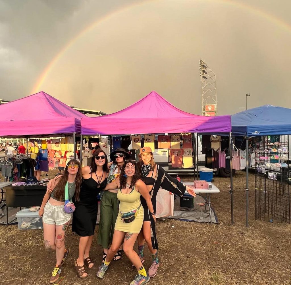 Some members of Girltour under a rainbow, Broomfield, CO, Courtney Westerkamp, Amanda Burgess, Sara Shabany, Lauren Pinto, Claire Christenson, Photo by Michelle Carnella.